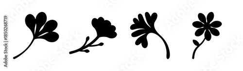 Silhouette illustration of four stylized floral elements with stems and petals in black and white