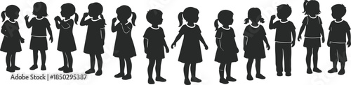 Children silhouettes collection with boys and girls in various standing poses, side and front views, black figures isolated on white