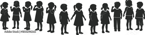 Set of children silhouettes with boys and girls in different standing poses, side and front views, black kid figures isolated
