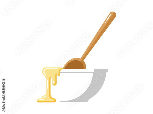 Honey pouring from spoon into bowl