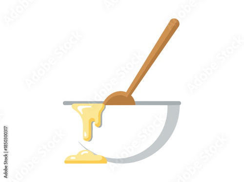 Honey pouring from spoon into bowl
