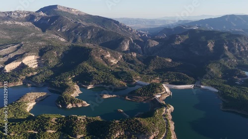 Cinematic Aerial 4K: Sweeping Wide-Angle Sunset Over Guadalhorce Lake, Pine Forests, and the Dramatic Caminito del Rey Gorge in Andalusia