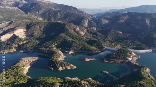 Cinematic Aerial 4K: Sweeping Wide-Angle Sunset Over Guadalhorce Lake, Pine Forests, and the Dramatic Caminito del Rey Gorge in Andalusia