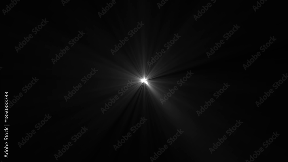 Obraz premium Bright light on black background with radiating beams