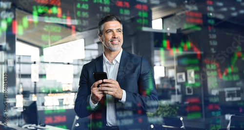 Happy stock investor or trader, financial adviser analyzing financial trading crypto market advertising digital mobile exchange app investing finances funds holding smartphone. Double exposure, banner