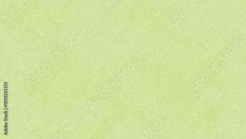 春を感じさせる淡い黄緑の和紙風テクスチャ背景素材