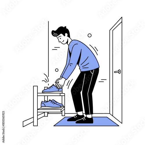 Young caucasian male organizing shoes on rack in minimalist room