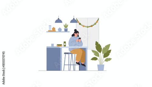 Woman browsing smartphone while sitting at a cozy counter in a modern domestic interior