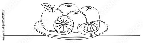 continuous one line drawing of fresh citrus fruits on a plate