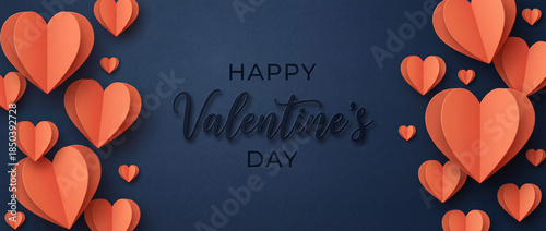 Happy Valentine's Day display with paper hearts on dark background