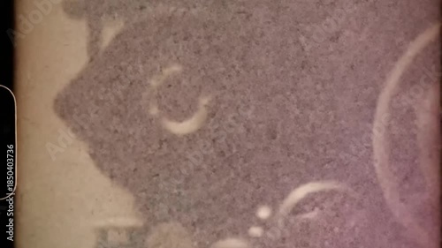 Vintage film displays hazy portrait silhouette