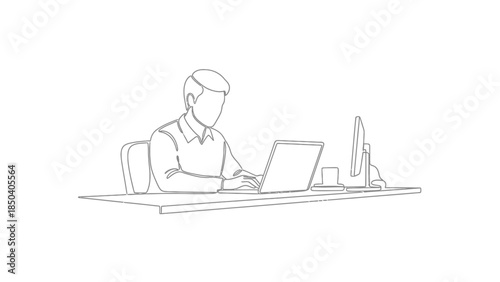 Man working on laptop at modern office desk with monitor