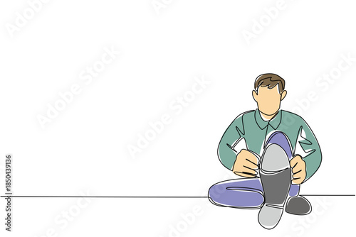 Continuous one line drawing a man wearing tap dance shoes sitting with his legs stretched out. Preparation for entering dance class. National Tap Dance Day. Single line draw design vector illustration