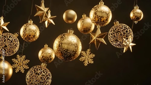 Golden christmas ornaments and stars hanging on strings against dark background for holiday decoration