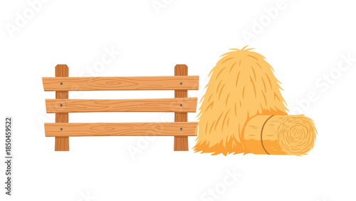 Wooden farm fence section next to a haystack and a round hay bale
