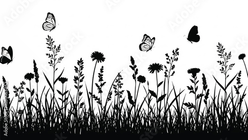 Butterflies flying above wildflowers and tall grass in a serene meadow scene captured from a gentle viewpoint