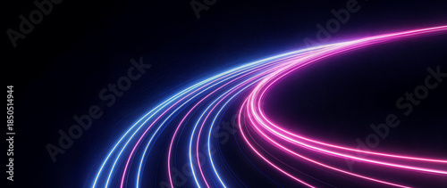 Abstract futuristic neon light trails background with dynamic curved lines in vibrant blue and pink colors. Glowing motion light streaks on dark background representing speed, technology, data flow, i