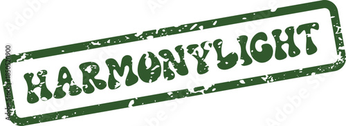 Green textured rubber stamp impression featuring the hopeful word HARMONYLIGHT in a distinctive groovy font style
