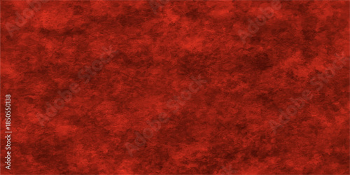 Vivid red grunge texture with a dark vintage pattern design and aged paint on an old wall backdrop creates a fiery textured material wallpaper for a festive Christmas card