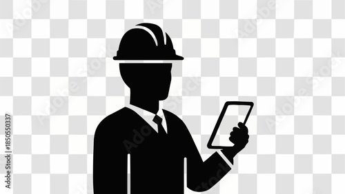 Silhouette of an engineer holding a tablet computer.