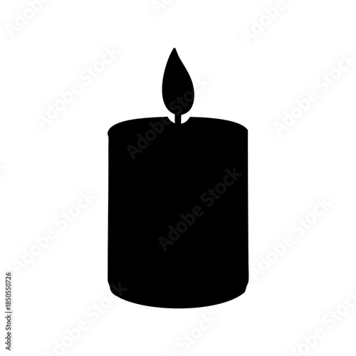 Monochrome silhouette of a burning candle providing illumination in the darkness