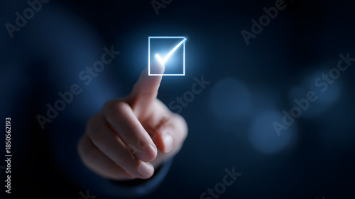 Digital Confirmation: A hand's index finger presses a digital checkbox. The image captures the essence of approval, validation, or a successful task completion.