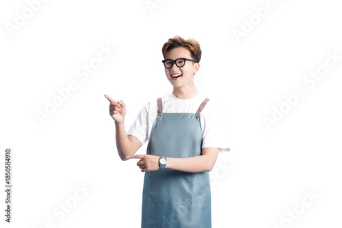 Joyful Guidance: A young man with glasses and apron, points with both hands, inviting the viewer into a world of possibility and discovery, radiating approachability.
