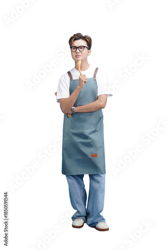 Obraz na plátně Creative Confectioner: An elegant individual, adorned in a sophisticated apron and eyeglasses, is engrossed in the art of culinary innovation while clutching a delectable ice cream