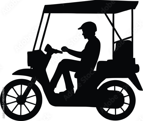 Silhouette of a driver operating a motorized rickshaw or autorickshaw with a canopy