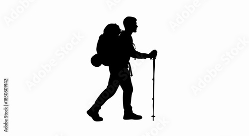 Silhouette of a Hiker with Backpack and Trekking Poles.