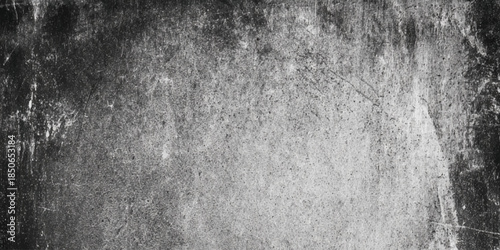 An abstract textured surface with a grunge or distressed look mostly dark gray, and light gray background in graphic design, web design.