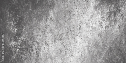 An abstract textured surface with a grunge or distressed look mostly dark gray, and light gray background in graphic design, web design.