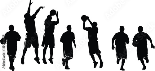Black silhouette of basketball players in motion on court