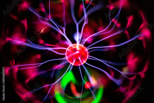 Colorful plasma lamp experiment on a black background