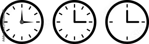 Three circular clocks displaying different times simple black and white design