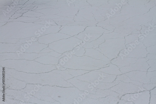 Abstract background - Ice in cracks close-up.