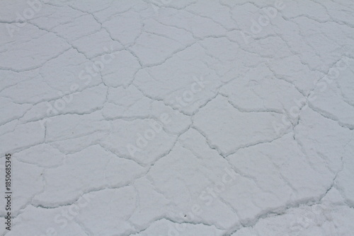 Abstract background - Ice in cracks close-up.