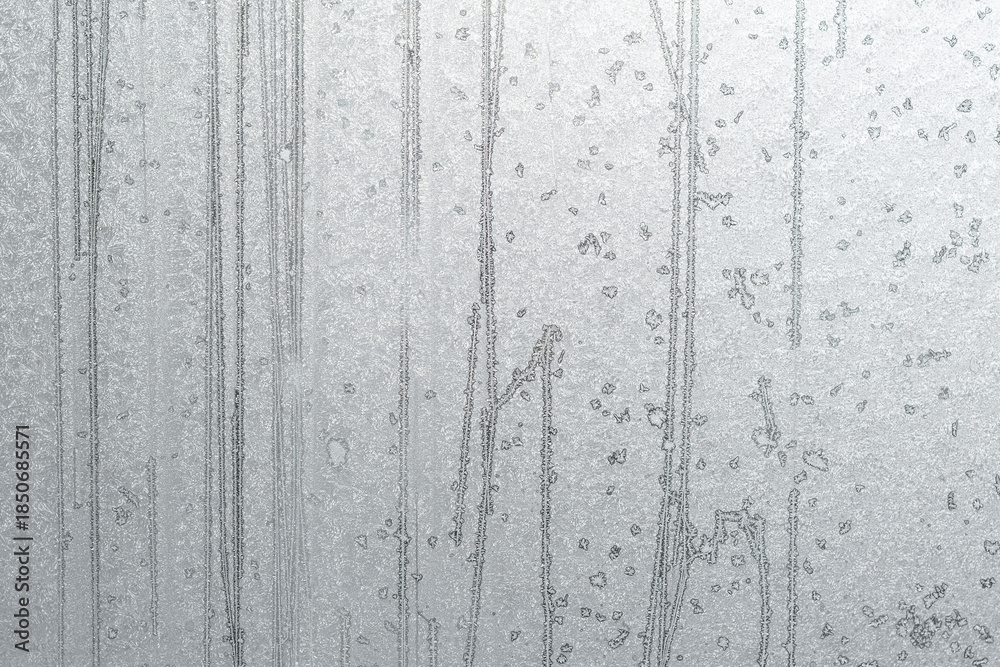 Obraz premium frost pattern on glass, background texture is your project