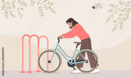 A woman parks her bicycle at a designated rack in a serene setting, symbolizing sustainability and a healthy lifestyle in a calm, picturesque environment.