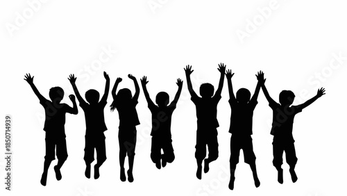 Silhouette of happy children jumping in the air with joy.