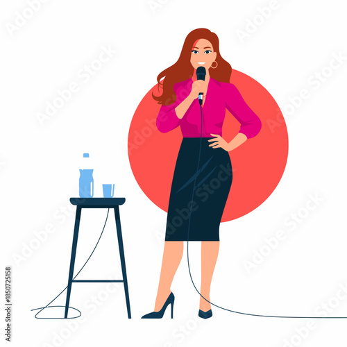 A confident woman stands on stage holding a microphone, projecting empowerment and poise as she engages with the audience, showcasing charisma and communication skills.