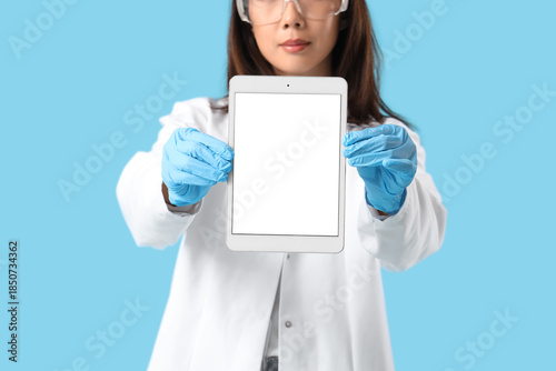 Female scientist with blank...