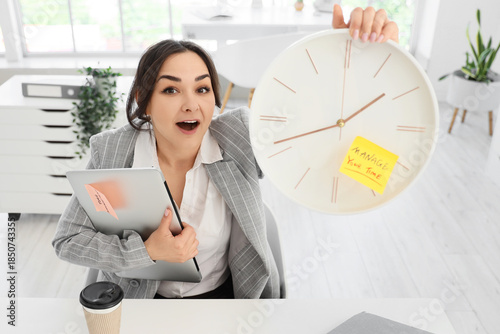 Shocked businesswoman with ...