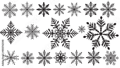 Collection of Various Black and White Snowflakes and Icicles for Winter Themes