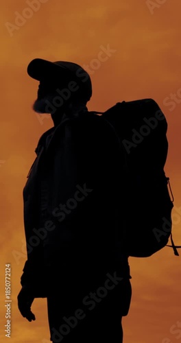 Man, silhouette and view for thinking, sunset sky or backpack for travel on summer adventure. Person, outdoor and perspective for reflection, bag or sightseeing with rest on trekking trip in nature