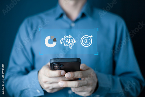 Businessman using smartphone and touch  virtual target interface, planning tasks, time management, and productivity. Business efficiency