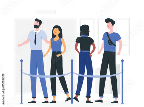 People waiting in line behind blue rope barrier queue desi