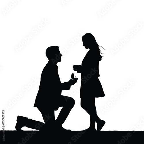 A romantic silhouette of a man proposing marriage to a surprised woman