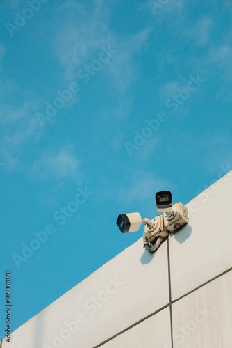 Minimalist Low Angle Security Camera Surveillance System against Blue Sky