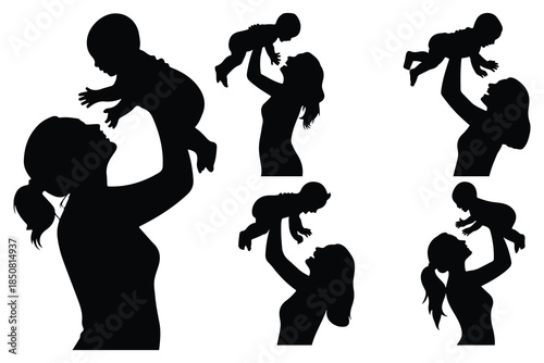 Silhouettes of parents holding and kissing children